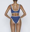 Swimwear Top. Pullover bikini sport bra style top  in dark Blue with Off White contrast binding outline. Bikini bottom. Mid to High Waisted Swimwear bottom in Dark Blue with Off White. Medium to full coverage bikini bottom. High Legs swimsuit bottom. Check out our fashion boutique swimsuit online shop. supper soft fabric Nylon/spandex. sport bikini